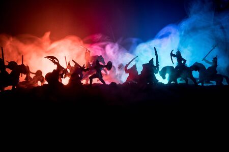 Medieval battle scene with cavalry and infantry. Silhouettes of figures as separate objects, fight...