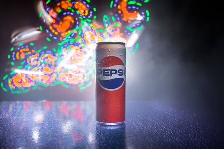 BAKU, AZERBAIJAN - APRIL 20,2019 : Pepsi can against dark toned foggy background. Pepsi is a...