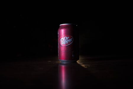 BAKU, AZERBAIJAN - SEPTEMBER 15, 2019: Can of Dr Pepper soft drink on dark toned foggy background with light. Dr Pepper was created in the 1880s.のeditorial素材