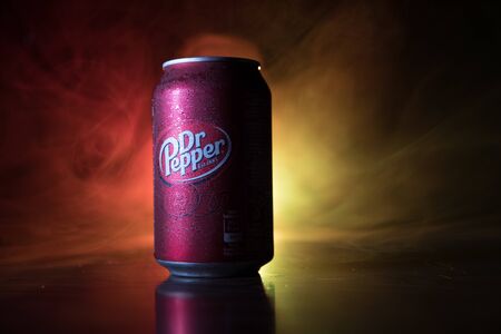 BAKU, AZERBAIJAN - SEPTEMBER 15, 2019: Can of Dr Pepper soft drink on dark toned foggy background with light. Dr Pepper was created in the 1880s.のeditorial素材