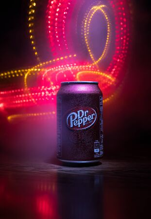 BAKU, AZERBAIJAN - SEPTEMBER 15, 2019: Can of Dr Pepper soft drink on dark toned foggy background with light. Dr Pepper was created in the 1880s.のeditorial素材