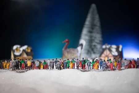 Thanksgiving celebration funny concept. Artwork decoration with Turkey tom statue on snow. Selective focus. Empty space for your textの写真素材