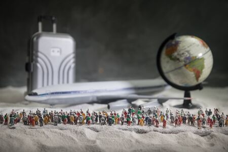 Merry Christmas and Happy new years travel concept background for winter trip. Christmas background with airplane. Creative artwork decoration on snow. Selective focus.の写真素材