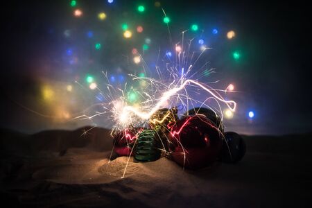 Winter holidays concept. Christmas background with baubles, on snow, free space for text. Christmas decoration. Festive background. Empty space for textの写真素材