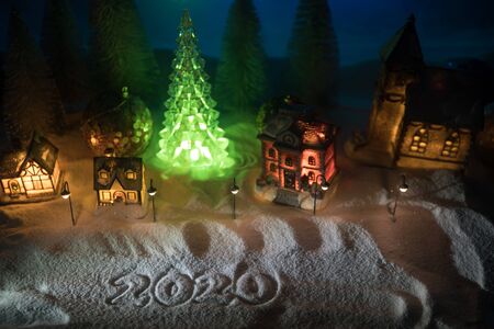 Winter holidays concept. Christmas background with baubles, on snow, free space for text. Christmas...