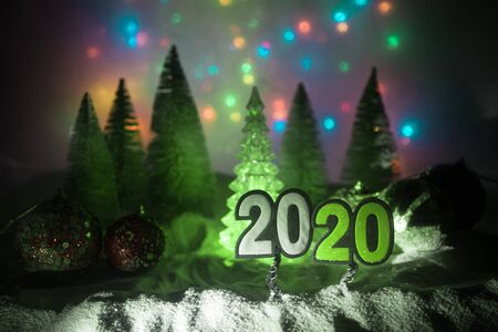 Winter holidays concept. Christmas background with baubles, on snow, free space for text. Christmas decoration. Festive background. Empty space for textの写真素材