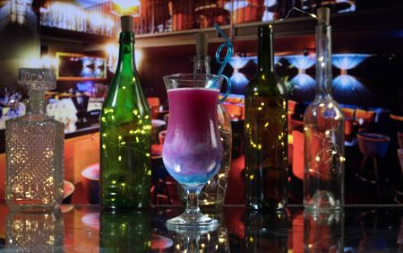 New Year and Christmas party concept. Different tasty cocktails with creative New Year holiday...