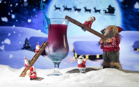 New Year and Christmas party concept. Different tasty cocktails with creative New Year holiday artwork decoration on background. Colorful cocktail in glass. Party club entertainment. Copy space.の写真素材