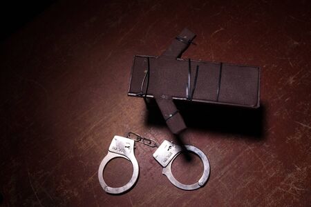 Lethal injection concept. Prisoner handcuffed to death by lethal injection. Creative artwork...