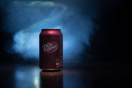 BAKU, AZERBAIJAN - SEPTEMBER 15, 2019: Can of Dr Pepper soft drink on dark toned foggy background with light. Dr Pepper was created in the 1880s.のeditorial素材