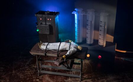 Lethal injection concept. Prisoner handcuffed to death by lethal injection. Creative artwork...