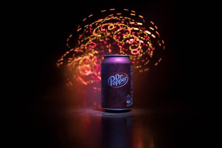BAKU, AZERBAIJAN - SEPTEMBER 15, 2019: Can of Dr Pepper soft drink on dark toned foggy background with light. Dr Pepper was created in the 1880s.のeditorial素材