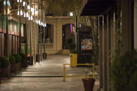 BAKU, AZERBAIJAN - APRIL 7, 2020 - Downtown Baku, Azerbaijan. Empty streets of Baku, the capital of Azerbaijan at night. Covid pandemic happeningのeditorial素材