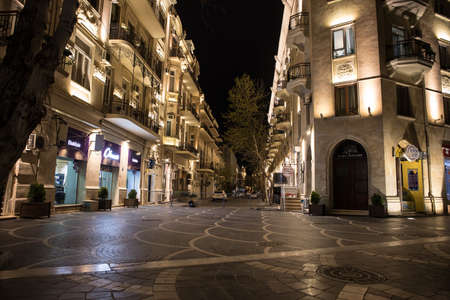 BAKU, AZERBAIJAN - APRIL 7, 2020 - Downtown Baku, Azerbaijan. Empty streets of Baku, the capital of Azerbaijan at night. Covid pandemic happeningのeditorial素材