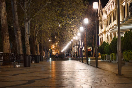 BAKU, AZERBAIJAN - APRIL 7, 2020 - Downtown Baku, Azerbaijan. Empty streets of Baku, the capital of Azerbaijan at night. Covid pandemic happeningのeditorial素材