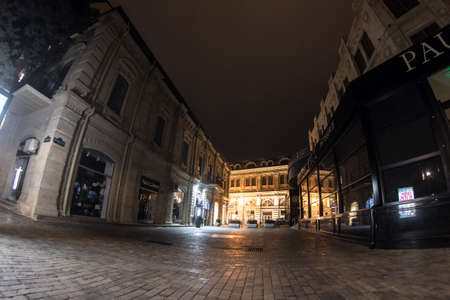 BAKU, AZERBAIJAN - APRIL 7, 2020 - Downtown Baku, Azerbaijan. Empty streets of Baku, the capital of Azerbaijan at night. Covid pandemic happeningのeditorial素材