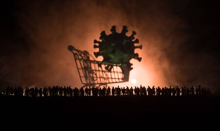 Coronavirus 2019-nCov novel coronavirus concept. Crowd looking on a big shopping trolley with Corona...