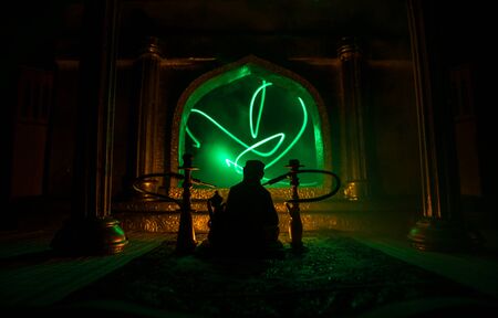 Shisha concept. A realistic Arabian interior miniature with window and columns. Hookah hot coals on...