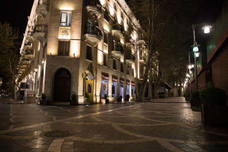 BAKU, AZERBAIJAN - APRIL 7, 2020 - Downtown Baku, Azerbaijan. Empty streets of Baku, the capital of Azerbaijan at night. Covid pandemic happeningのeditorial素材
