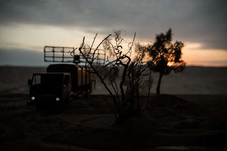 The field burns near railway. Dry grass field on fire. Zoom shotの写真素材