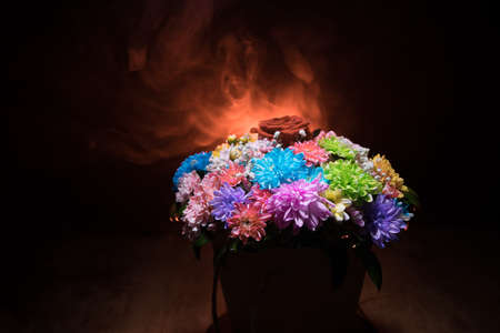 Still life with Hazelnut shells on rustic old wooden table. Creative table decoration. Closeup. Selective focusの写真素材