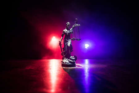 Law concept. Miniature colorful artwork decoration with fog and backlight. The Statue of Justice - lady justice or Iustitia / Justitia the Roman goddess of Justice. Selective focusの素材 [FY310156059699]