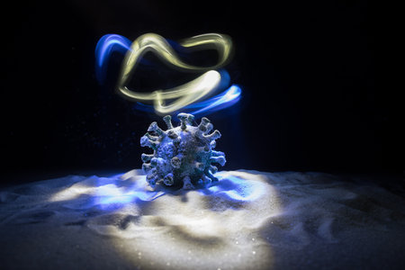 Celebrating winter and Christmas holidays in the new Covid-19 reality. Traditional holiday attributes and covid novel on snow. Creative artwork decoration. Merry healthy Christmasの写真素材