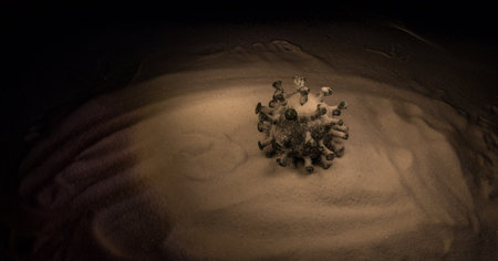 Celebrating winter and Christmas holidays in the new Covid-19 reality. Traditional holiday attributes and covid novel on snow. Creative artwork decoration. Merry healthy Christmasの写真素材