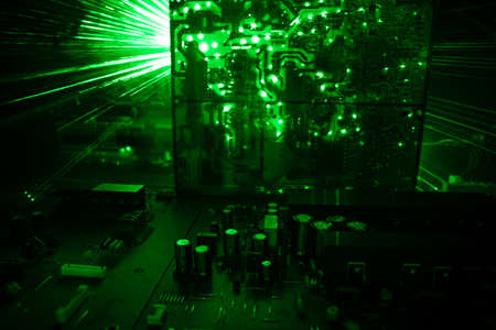 Creative concept of modern technology, inside an electronic device. Electronic circuit board close...
