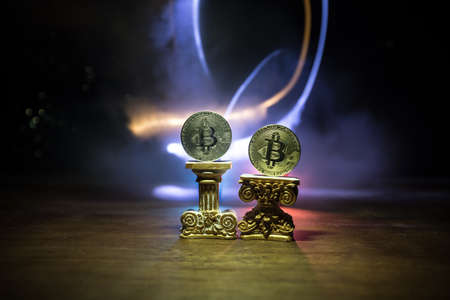 Golden Bitcoin on dark backround. New virtual money. Crypto currency. Creative artwork decoration. Selective focusの写真素材