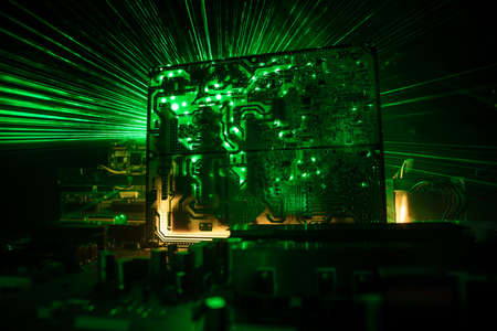 Creative concept of modern technology, inside an electronic device. Electronic circuit board close...