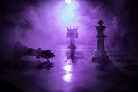 Beautiful crown miniature on chessboard. chess board game concept of business ideas and competition...