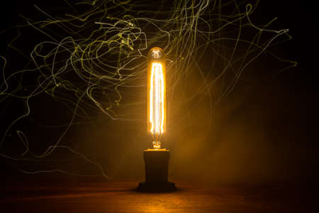 Beautiful retro luxury interior bulb lighting lamp decor glowing in dark. Selective focusの写真素材