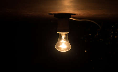Beautiful retro luxury interior bulb lighting lamp decor glowing in dark. Selective focusの写真素材