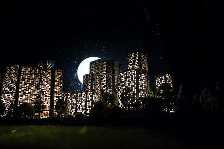Cartoon style city buildings. Realistic city building miniatures with lights. background. Decorative...