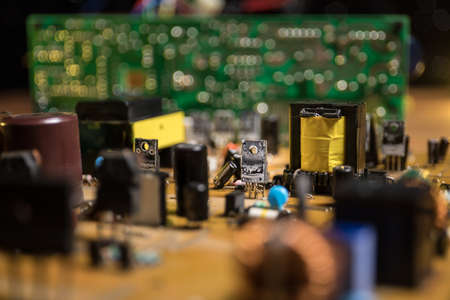 Creative concept of modern technology, inside an electronic device. Electronic circuit board close...