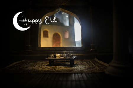 A realistic Arabian interior miniature with window and columns. Meals are served before sunrise called Suhur. Festive greeting card, invitation for Muslim holy month Ramadan Kareem. Selective focusの写真素材