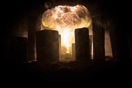 Nuclear war apocalypse concept. Explosion of nuclear bomb in city. City destroyed by atomic war. Creative artwork decoration in dark. Selective focusの写真素材