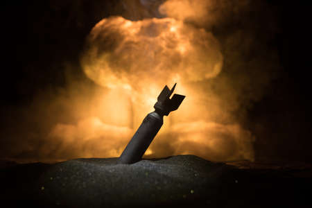 Nuclear war concept. Explosion of nuclear bomb. Creative artwork decoration in dark. Selective focusの写真素材