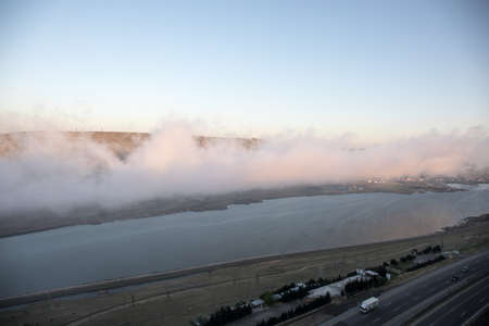 Beautiful clouds flying over the lake near mountains. Evening time shot over the clouds. Baku, Azerbaijan. Hojasan lakeの写真素材