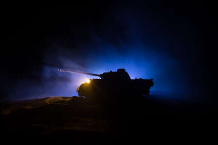 War Concept. Military silhouettes fighting scene on war fog sky background, World War Soldiers...