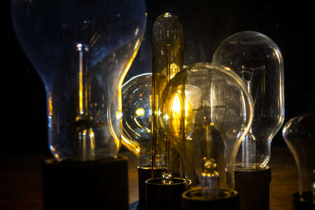 A lot of bulbs. Beautiful retro luxury interior bulb lighting lamp decor glowing in dark. Selective...