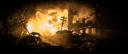 War Concept. Military silhouettes fighting scene on war fog sky background, World War Soldiers Silhouette Below Cloudy Skyline At night. Battle in ruined city. Selective focusの写真素材