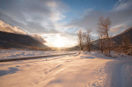 Majestic sunset in the winter mountains landscape. Dramatic sky. Azerbaijan nature. Shakiの写真素材