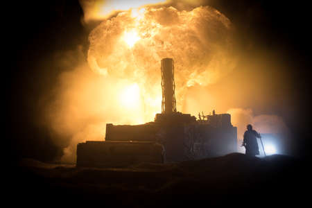 Creative artwork decoration. Chernobyl nuclear power plant at night. Layout of abandoned Chernobyl station after nuclear reactor explosion. Selective focusの写真素材
