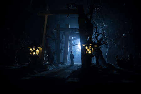 Creative artwork decoration. Abstract Japanese style wooden tunnel at night. Night scene in fantasy forest. Selective focusの写真素材