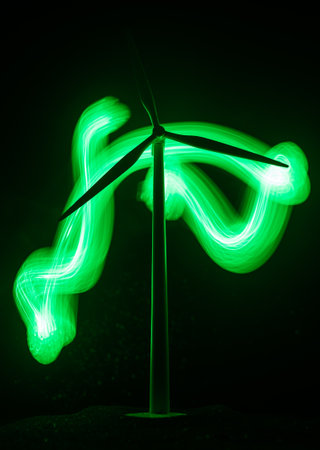 Electricity power in nature or clean energy concept. Wind Turbine producing alternative energy on...