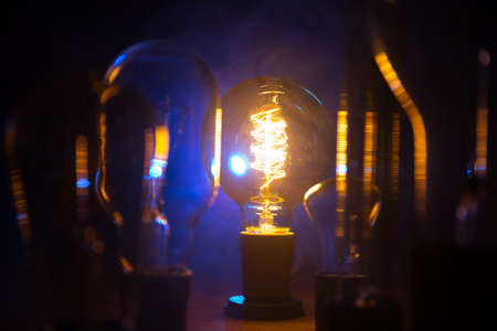 A lot of bulbs. Beautiful retro luxury interior bulb lighting lamp decor glowing in dark. Selective focusの写真素材