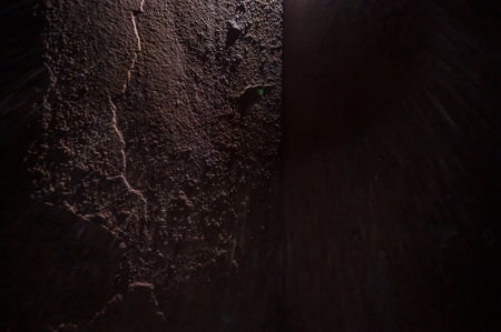 Dark brown stone old concrete wall background texture grunge and brown surface with spaceの写真素材