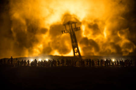 Creative artwork decoration - Russian war in Ukraine concept. Crowd looking at giant explosion and giant watchtower. selective focusの写真素材